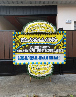 Papan Bunga Duka di Pakemitan